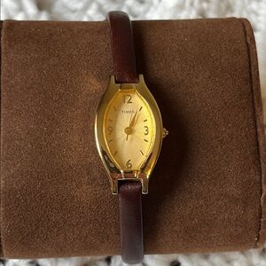 Timex 18mm Gold Tone Face and Dial Slim Brown Leather Band. Needs cell Battery